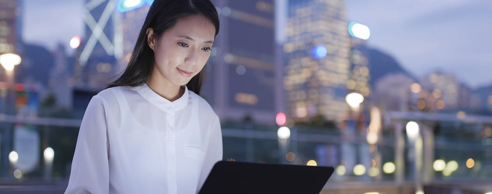 A working female professional working on her laptop.