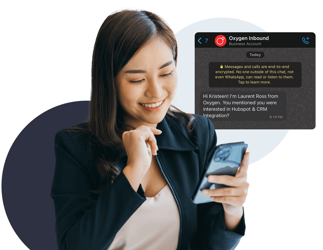 Woman looking at automated WhatsApp message from a Business account